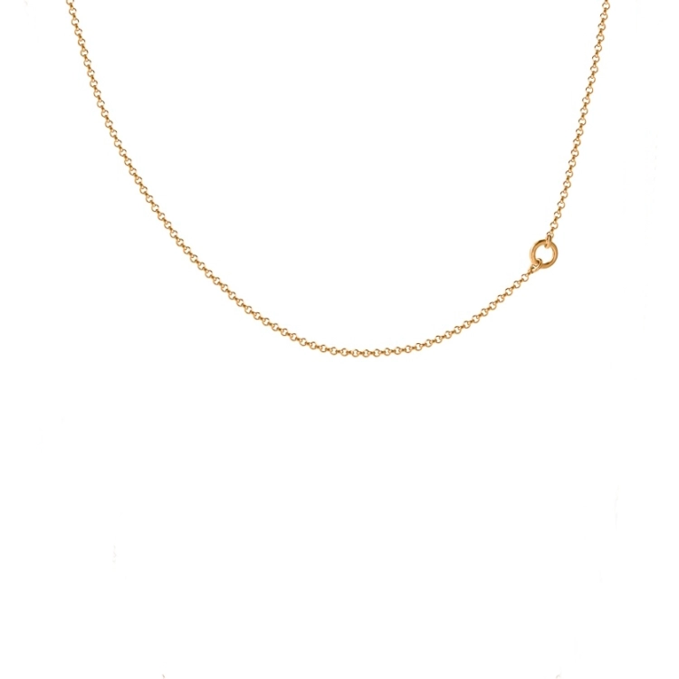 Złocona bransoletka na kostkę z delikatnym łańcuszkiem i ozdobnym kółeczkiem.